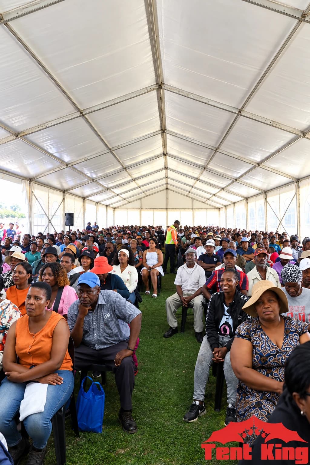 Large community event hosted under a Tent King marquee