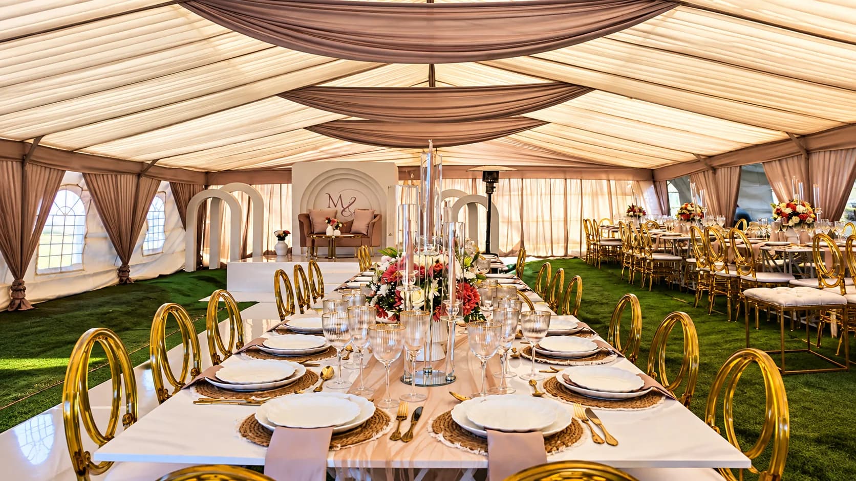 Luxury event marquee with formal dining setup